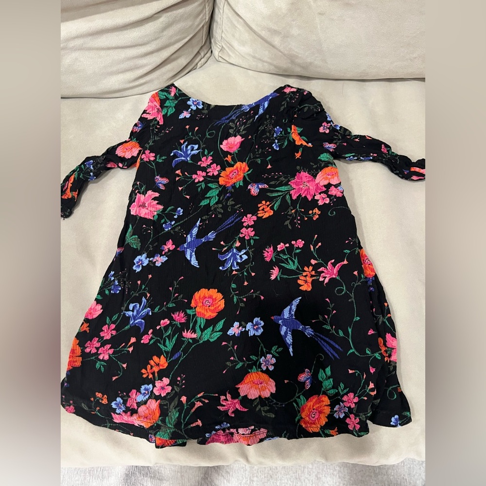 Black floral crepe dress.